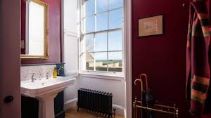 Traditional powder room, denver wallpaper above a marble tile wainscot in this powder bath is accented with mosaic marble floor tile and gold metals. 18 Elegant Traditional Powder Room Interiors That Will Stun You