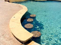 This Swim Up Bar With Tiled Stools Is A Great Place To Lounge A Canopy Can Easily Be Added In Th Natural Swimming Pool Natural Swimming Pools Pool Water Slide