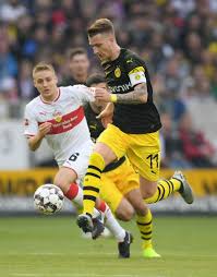 Marco Reus Of Borussia Dortmund Is Challenged By Santiago Ascacibar Borussia Dortmund Dortmund Marco Reus