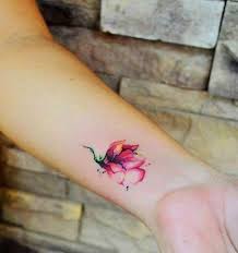 Wrist is a small area that has a ample range of possibilities for tattooing small, endearing and colorful flower designs. Flower Tattoo Designs For Women Wrist Wiki Tattoo