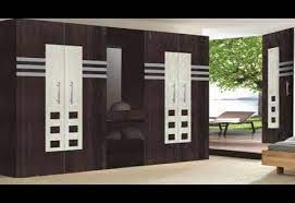 The island performs multiple tasks that keep this space uncluttered, as it is home to the sink, stovetop and serves as a serving piece showcase that perfectly matches the cabinets and brings the whole room together. Modern Wardrobe Designs Savillefurniture