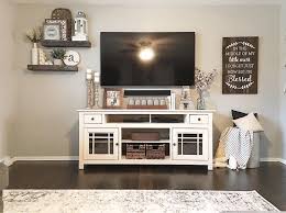Electrical devices and game consoles can be arranged on a shelf or entertainment centre tv stand with shelves. 4 Amazing Unique Ideas Living Room Remodel Before And After Exposed Beams Living Room Remodel On A Budget Farm House Living Room Rustic Living Room Home Decor