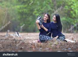 Two Asien Girl Outdoor Listen Radio Stock Photo 404462161 | Shutterstock