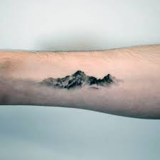 Top 47 Minimalist Mountain Tattoo Ideas 2021 Inspiration Guide Mountain Tattoo Outdoor Tattoo Tattoos