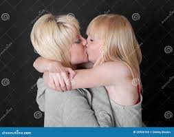 Blondes kissing