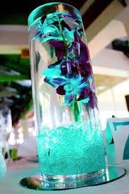 Pin By Zindy Aguilar On Neon Wedding Ideas Turquoise Centerpieces Turquoise Wedding Wedding Centerpieces
