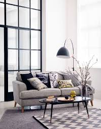 A Modern Living Room Showcasing A Grey Sofa With Printed Monochrome Cushions A Contemporary Floor Lamps Living Room Living Room Design Modern Living Room Diy