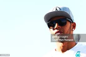 Nicolas and Jean Todt speak to Eric Boulier following practice for... News  Photo