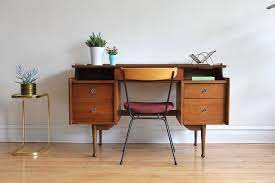 The desks clean design and round tapering legs make it the perfect complement to the camaflexi. Pin On Mid Century Design