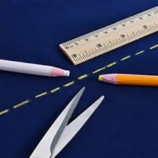 Membuat Tanda Pola Pada Bahan Kain Dengan Pensil Kapur