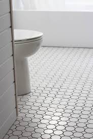 See blogger dans le lakehouse's bathroom renovation ideas and how she'll build a sliding barn door. Bathroom Makeover Week 3 Tile Love Grows Wild