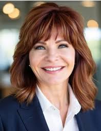 The warmth from this fireplace isn't a mere detail; it's the heart of this  home. Imagine cozying up with a good book