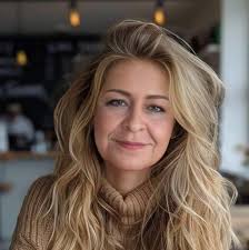 Michelle Pfeiffer is joined by Elle and Dakota Fanning as she attends her  hand and footprint ceremony at the TCL Theater.