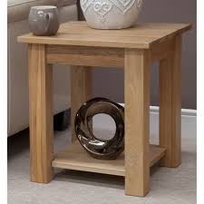 Opus is a gracious ellips shaped coffee table, available in three different sizes and also with or without newspaper shelf. Opus Solid Oak Furniture Lamp Table Free Delivery
