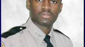 Widow sues Ford Motor Co. over FHP trooper's death in turnpike crash