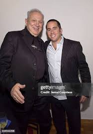 Candice Lock and Alfred Mui during Ron Galella Book Signing for "Ron...  News Photo