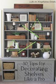 10 Tips For Decorating Shelves Like A Pro With Some Planning And Practice You Ll Be Able To Decorate Decorating Shelves Decorating Bookshelves Bookcase Decor