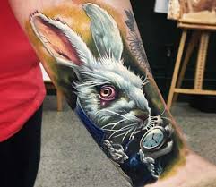 Among all the locations, shield tattoos are mostly done on arms as they are clearly visible. White Rabbit Tattoo By Ben Kaye Post 18703