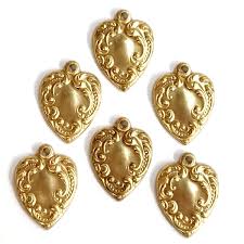 Crafted in a lovely mix of yellow and rose gold, this handmade. Brass Hearts Heart Charms Jewelry Making Jewelry Supplies Victorian Hearts Charms Bracelets Brass Stampings Heart Stampings