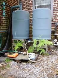 Ace offers water barrels in a range of capacities rain barrels collect water from your home's roof using a rain barrel diverter that connects to the downspout and directs water into the barrel. Pin On Gardening