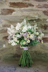 A traditional indian bride and groom partake in hindu wedding customs and traditions during their nuptial ceremony in southern. An Indian Tikka And Sequins For A Cornish Seaside Summer Wedding Love My Dress Uk Wedding Summer Wedding Bouquets Wildflower Wedding Bridal Bouquet Pink