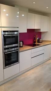 Our doors are off white (grey hue instead of cream) and washed oak worktops. Handless Gloss Kitchen Light Oak Worktops Accented With Fuchsia Glass Kitchen Ideas Modern Gloss Kitchen Design Kitchen Remodel Small Space Kitchen