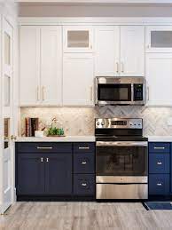 Other fun ideas for kitchen cabinets include color blocking or ombre. White Cabinets On Top Blue On Bottom Kitchen Cabinet Design Kitchen Cabinets Decor Modern Kitchen Cabinets