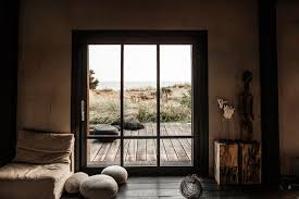 Matieres Brutes Pour Cette Maison De Vacances Ferienhaus Wohn Design Schone Beleuchtung