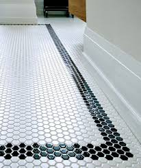 Stunning as they are striking, black tiles make an impact on design. Roncesvalles House White Bathroom Designs Penny Tiles Bathroom Tile Bathroom