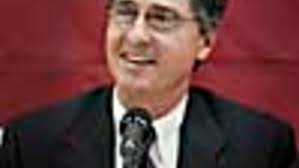 The New Football Coach: An Heir to Walsh?