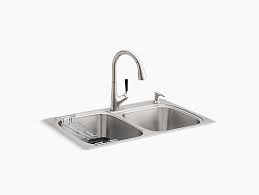 They have one drain and one faucet. K R75791 2pc Kohler All In One Kit Top Undermount Kitchen Sink Kohler