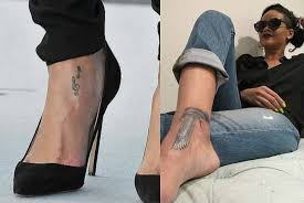 Rihanna has a discrete taste for tattoos and she knows where to place her tattoos to put them on display. Rihanna S Tattoos Hand And Chest Tattoos Nose Job Celebily