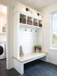 The black metal frame perfectly accents. Pin By Stephanie On Wildhurst Cabinets Mudroom Laundry Room Mudroom Decor Laundry Room Makeover