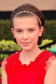 Millie Bobby Brown S Curly Hair Brown Curly Hair Curly Hair Styles Bobby Brown