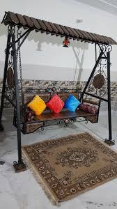 Overall the unit is polished in walnut finish. Shilpi Iron Wooden Swings Jhoola For Home Garden Floor Standing Amazon In Furniture