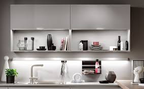Illuminated overtop shelves look stylish and modern. Hacker Kitchen Styles Discover Kitchens That Perfectly Match Your Life
