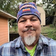 Melah Perkins, a member of the Deer Clan from the Wolftown Community, had  an official contract signing