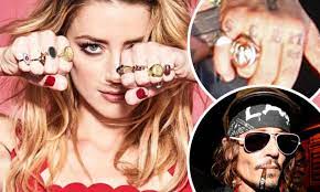 Stephen deuters told london's high court that ms heard, 34, subjected mr depp, 57, to. Amber Heard Appears To Poke Fun At Johnny Depp S Scum Tattoo Daily Mail Online