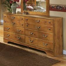 Bittersweet Drawer Dresser In Rustic Pine Finish Famous Brand Furniture Ashley Furniture Bedroom Ashley Furniture Furniture