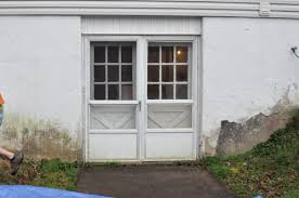 Once in place, use a nail on the top right side of the frame to secure the door. How To Install A Patio Door