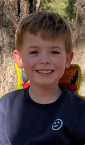 Could someone please edit the background to have him standing in the woods?