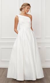 A full length, satin twill dress kisses the earth you walk on while charming slash pockets make a nonchalant, carefree statement. One Shoulder Long White Prom Gown With Pockets