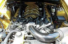 But you can't just drop a nascar race car engine in a mustang and bolt up the rest of the powertrain. How To Install A Coyote 5 0l Engine On A New Edge Mustang New Edge Mustang Mustang Mustang Engine