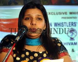 The only woman whistler Kruti K. Shah performing at the whistling concert,  organised by Whistler...