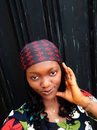 I gave this girl the small orange I had, and she said it was too little.  Then another girl took it, even though it wasn't easy for her. In the end, I