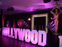 Decorate your table with a bag of silver and black confetti, with lights, cameras, movie reels and star designs. Hollywood Wedding Theme Arabia Weddings