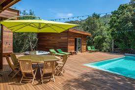 Style unique entre mer et montagnes, sur un terrain de 12 600m² arboré. Villa Bois Haus Vermietungen Porto Vecchio Suden Korsika