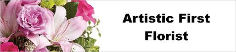 A beautiful garden with many plants and flowers with butterflies and birds. Artistic First Florist Vero Beach Fl 32960 Aquatek Pro