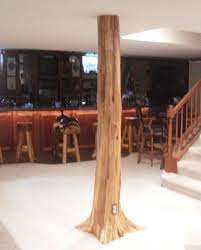 Most common uses are as part of a breakfast bar, or family room bar, as a bookshelf, a room divider or a combination bookshelf/room divider. Authentic Rustic Cedar Log Basement Pole Covers Support Post Wrap Basement Pole Covers Small Basement Remodel Rustic Basement
