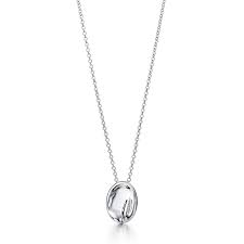 The cancer zodiac necklace features an engraved, rectangular gold pendant on a fine gold chain. Elsa Peretti Zodiac Pendant Cancer Sterling Silver Tiffany Co